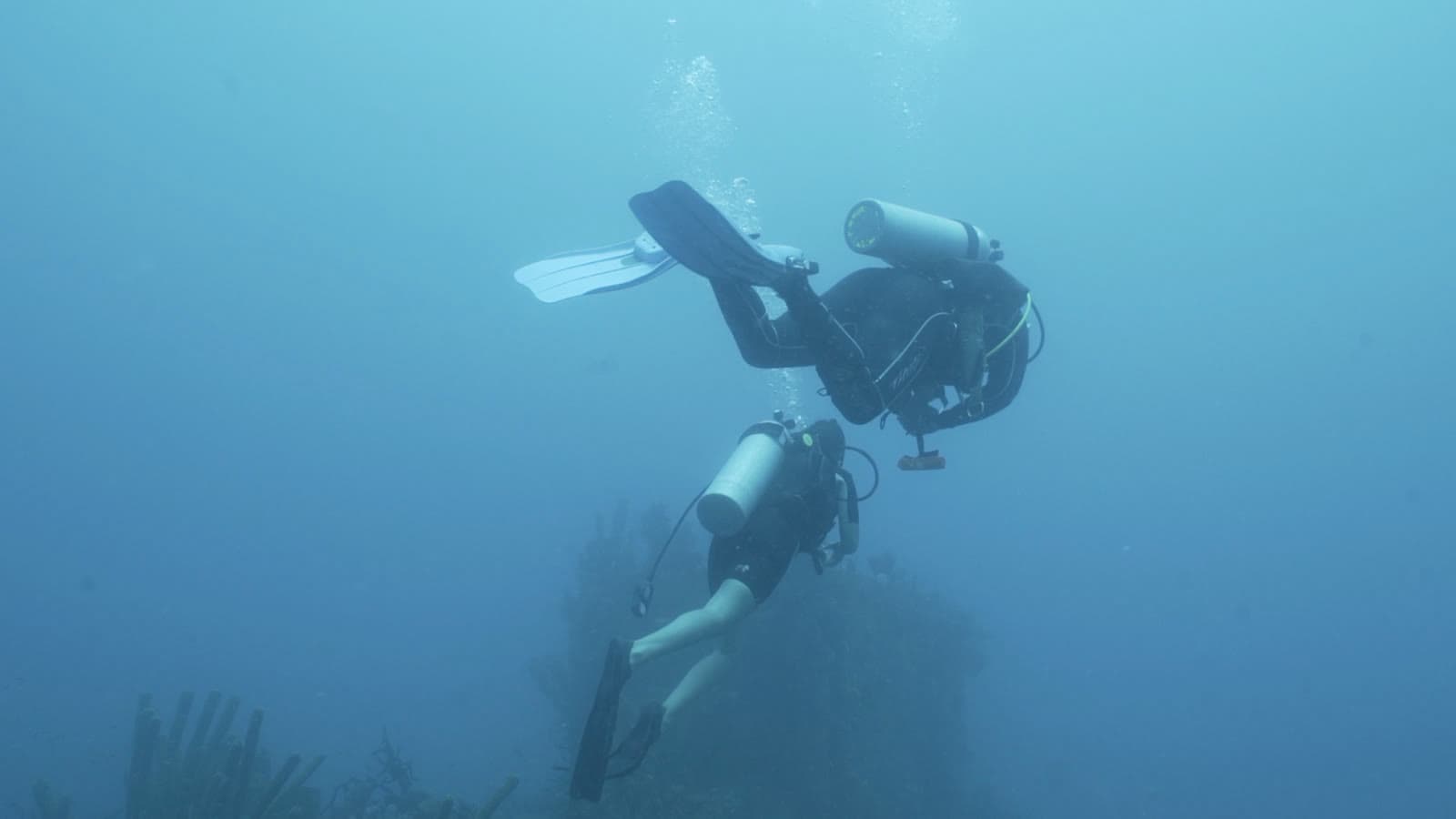Two members of the Granito de Arena dive unit working underwater